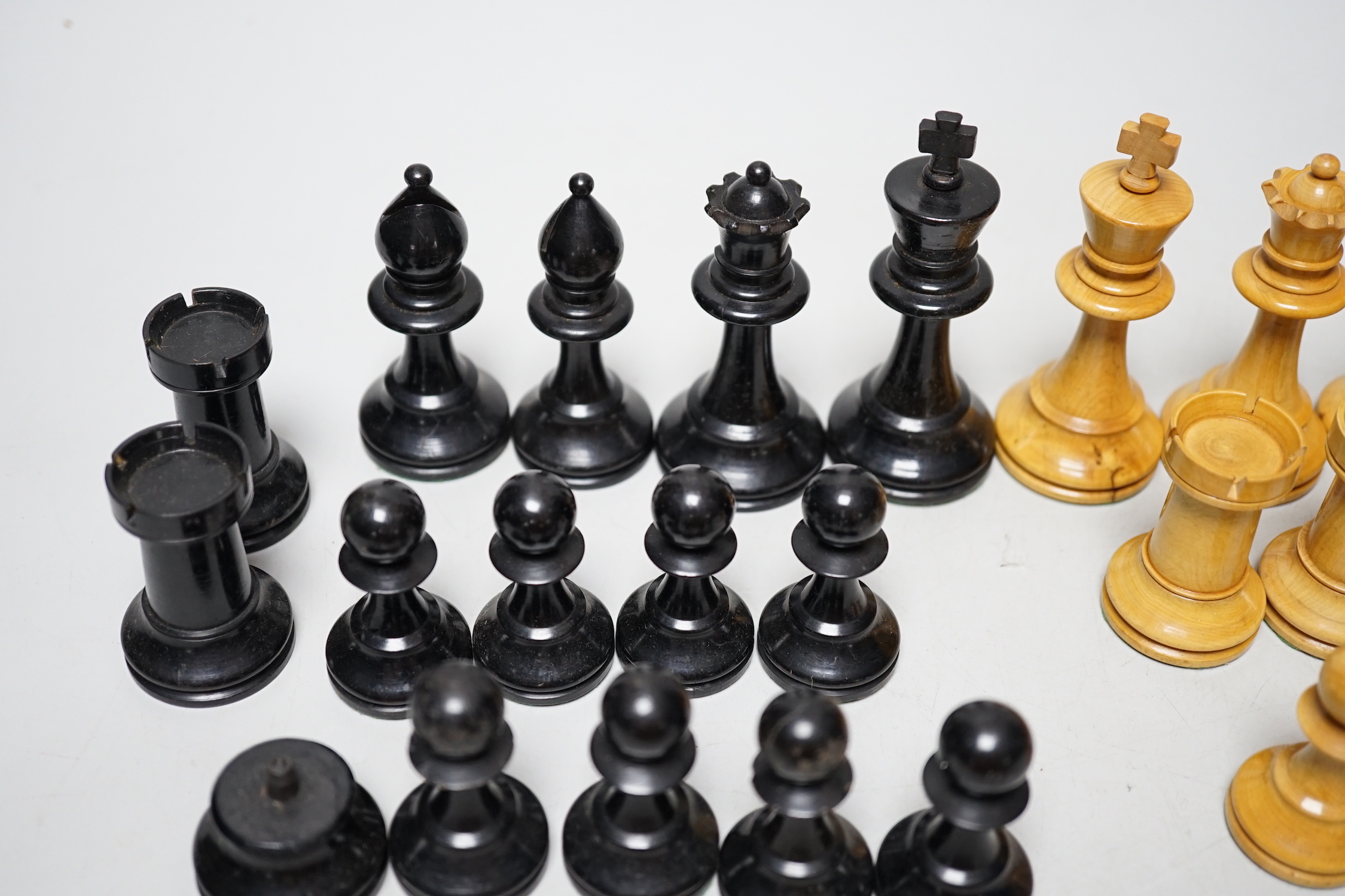 A Staunton pattern lead weighted part boxwood and ebony chess set, kings 8.3cm high (incomplete, lacking both black knights)